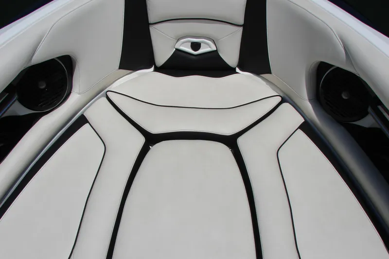 Slide: The Image of 2019 Centurion Ri257 boat interior with sleek white and black seating design. - 33