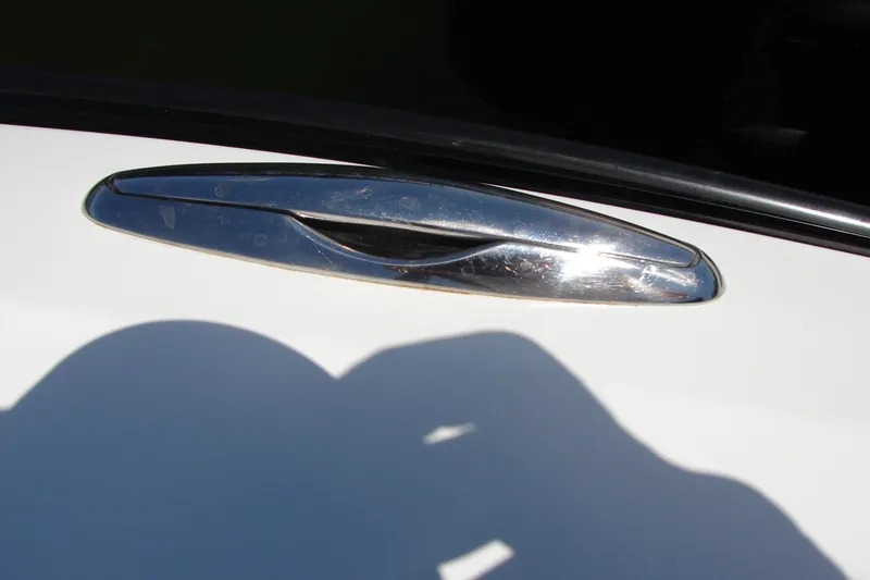 Slide: The Image of Chrome door handle on 2019 Centurion Ri257 boat. - 34