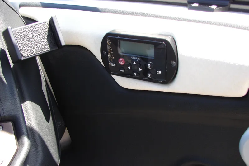 Slide: The Image of 2019 Centurion Ri257 interior with Clarion audio control panel. - 35