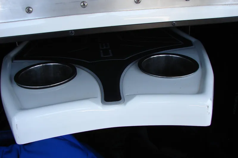 Slide: The Image of 2019 Centurion Ri257 boat cup holders and storage compartment. - 45