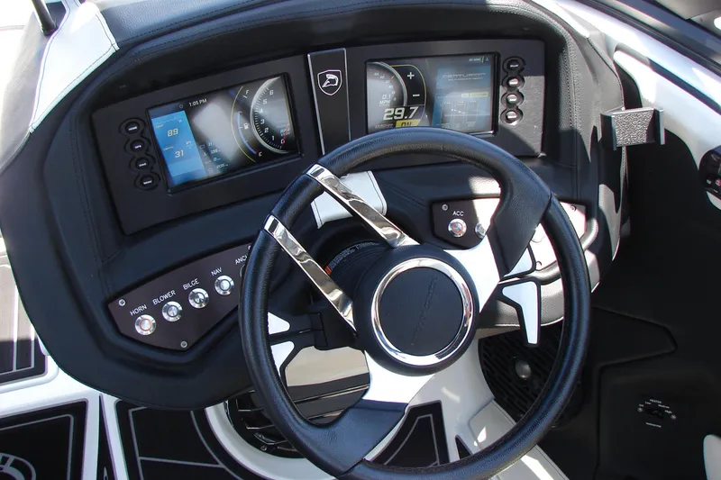 Slide: The Image of 2019 Centurion Ri257 dashboard with steering wheel and digital displays. - 49