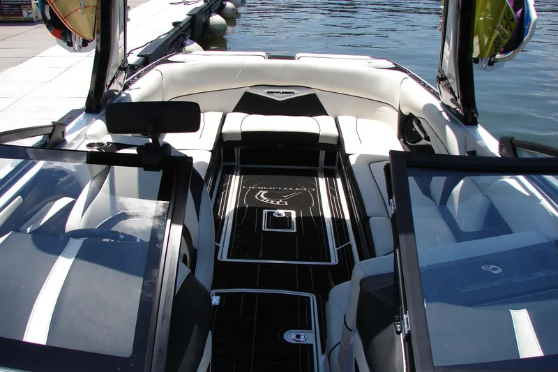 Slide: The Image of 2019 Centurion Ri257 boat interior with sleek seating and modern design. - 51