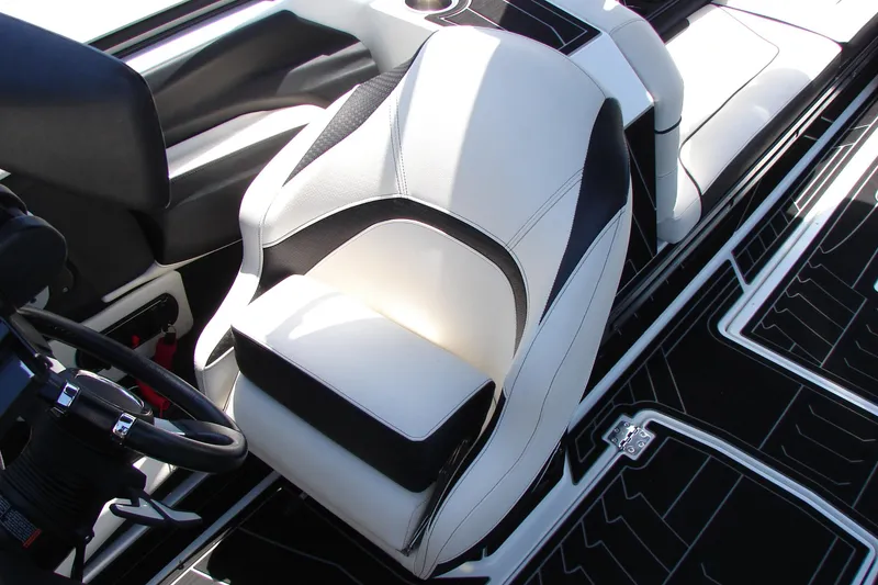 Slide: The Image of 2019 Centurion Ri257 boat interior with sleek black and white seating design. - 52