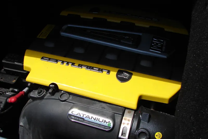 Slide: The Image of 2019 Centurion Ri257 engine with yellow cover and Catanium label. - 54