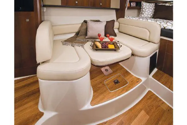 Slide: The Image of 2016 Chaparral 290 Signature interior with elegant seating and wooden flooring. - 22