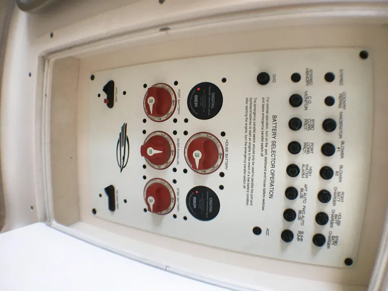 Slide: The Image of Control panel of a 2016 Chaparral 290 Signature boat with battery selector switches. - 41