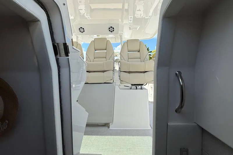 Slide: The Image of Interior view of 2022 Regal 38 SAV boat with luxurious seating and modern design. - 28