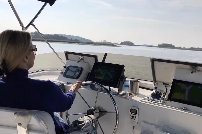 Slide: The Image of Centerline Helm on Flybridge with pop-up electronics consoles - 14