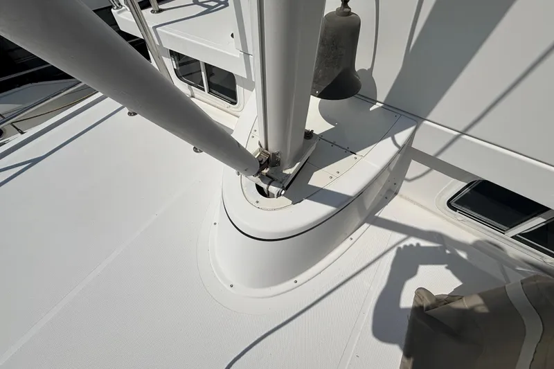 Slide: The Image of Hinged Mast on Aft Deck of 2005 Nordic Tug 37 Flybridge lowers for low vertical clearance - 20