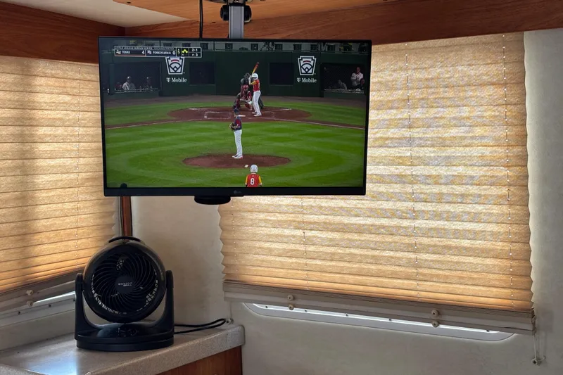 Slide: The Image of Television showing baseball game inside 2005 Nordic Tug 37 Flybridge boat cabin. - 24