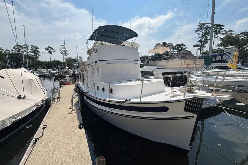 Slide: The Image of 2005 Nordic Tug 37 Flybridge Dockside - 5