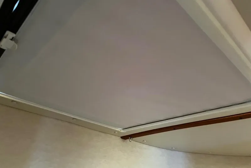 Slide: The Image of Oceanair hatch cover with blackout shade pulled under Bomar Hatch - 53