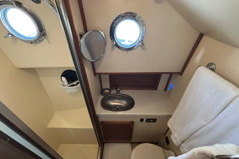 Slide: The Image of Head compartment on 2005 Nordic Tug 37 with separate shower stall with molded seat - 58