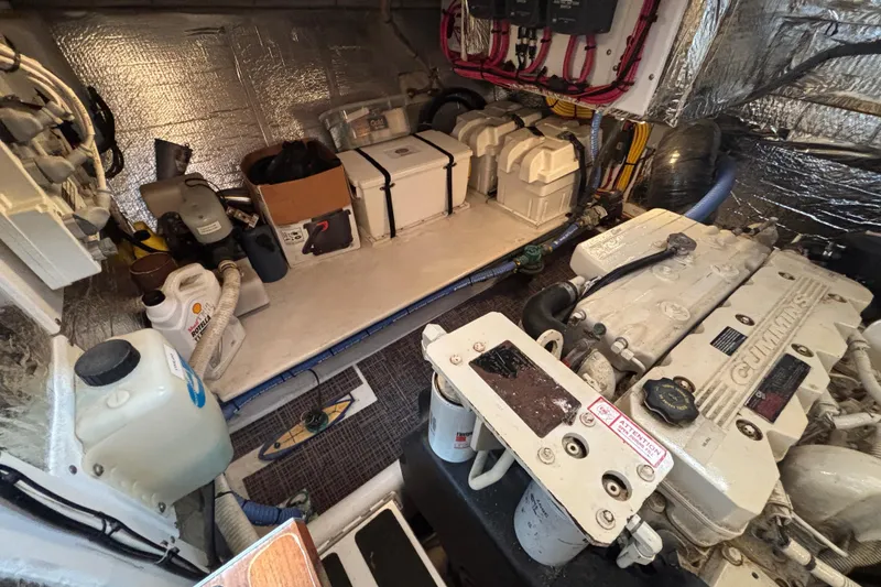 Slide: The Image of Engine Compartment to starboard side on 2005 Nordic Tug 37 showing battery banks - 63