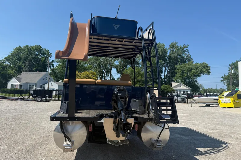 Slide: The Image of 2025 Tahoe Pontoon Cascade Cruise Funship with slide and ladder, parked outdoors. - 18