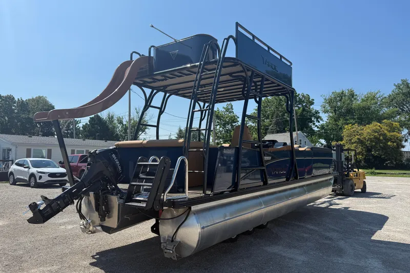 Slide: The Image of 2025 Tahoe Pontoon Cascade Cruise Funship with slide, parked outdoors. - 19