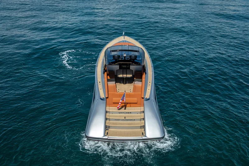 Slide: The Image of 2024 Wajer 55 HT luxury yacht cruising on open water, rear view. - 14