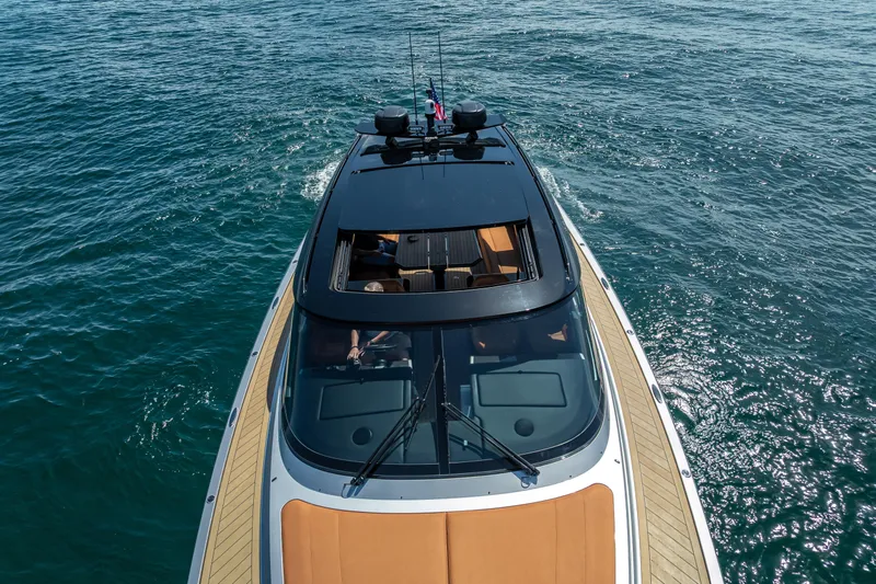 Slide: The Image of 2024 Wajer 55 HT luxury yacht cruising on open water, top view. - 16