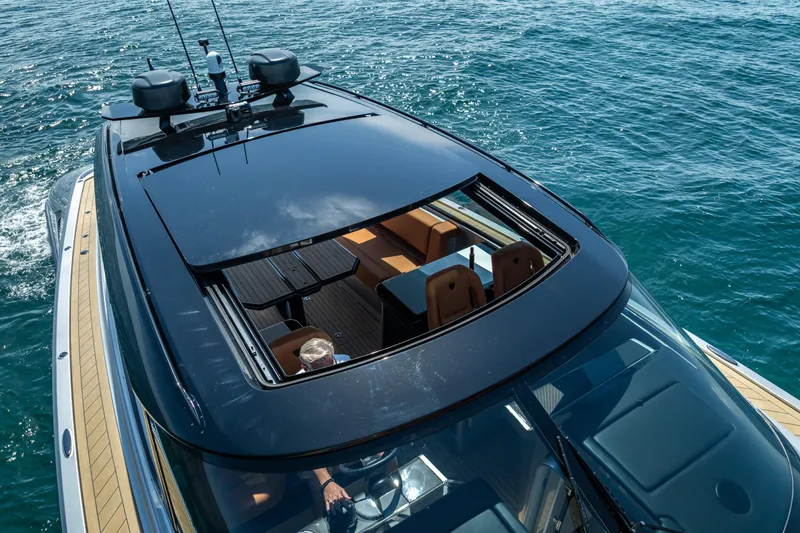 Slide: The Image of 2024 Wajer 55 HT yacht with open sunroof cruising on the ocean. - 18