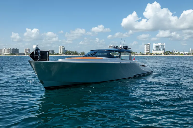 Slide: The Image of 2024 Wajer 55 HT yacht cruising on a sunny day near city skyline. - 20