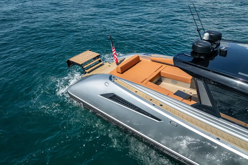 Slide: The Image of 2024 Wajer 55 HT luxury yacht cruising on open water, featuring sleek design and spacious deck. - 26