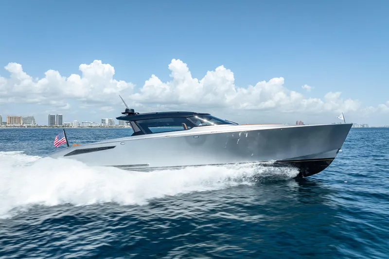 Slide: The Image of 2024 Wajer 55 HT yacht cruising on open water under a clear blue sky. - 28