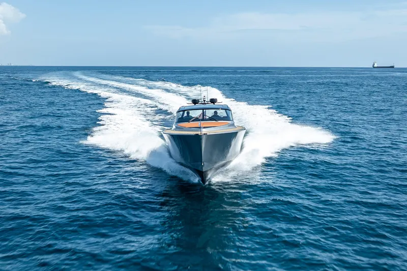 Slide: The Image of 2024 Wajer 55 HT yacht cruising on open sea, leaving a trail of white wake. - 30