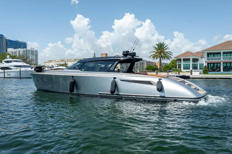 Slide: The Image of 2024 Wajer 55 HT luxury yacht cruising in a scenic waterfront setting. - 38