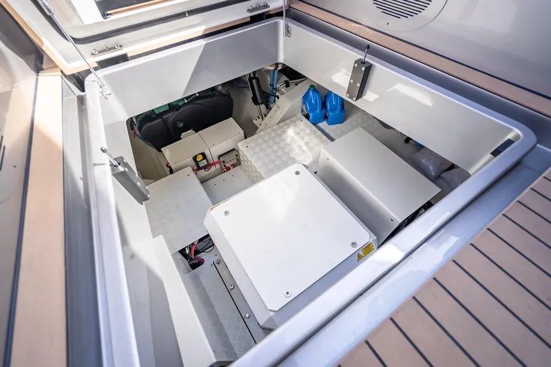Slide: The Image of Engine compartment of 2024 Wajer 55 HT yacht, showcasing mechanical components and storage. - 39