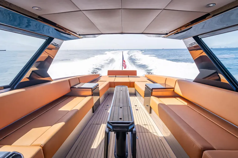 Slide: The Image of Luxurious 2024 Wajer 55 HT yacht interior with sleek seating and ocean view. - 55