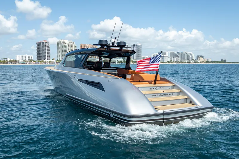 Slide: The Image of 2024 Wajer 55 HT yacht cruising near Fort Lauderdale with American flag. - 6