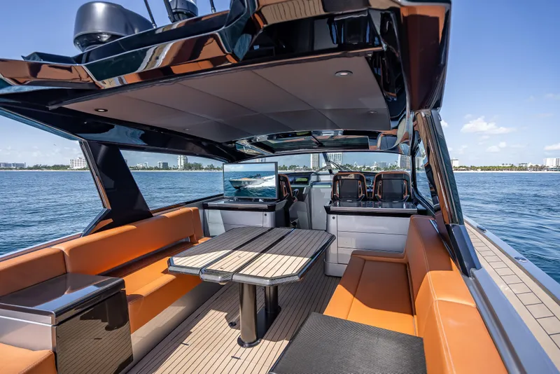 Slide: The Image of Luxurious 2024 Wajer 55 HT yacht interior with sleek seating and ocean view. - 62