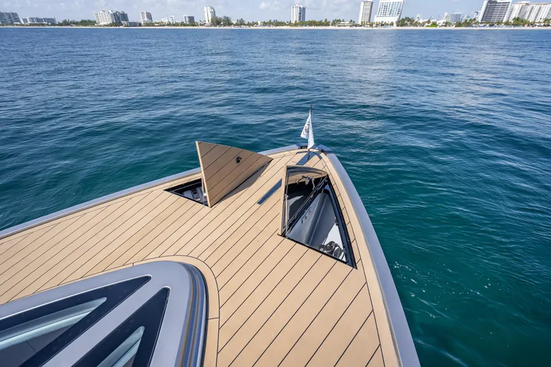 Slide: The Image of 2024 Wajer 55 HT yacht on calm ocean, city skyline in background. - 64