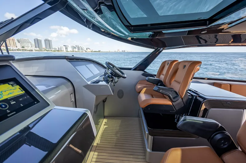 Slide: The Image of Luxurious interior of 2024 Wajer 55 HT yacht with modern dashboard and leather seating. - 74
