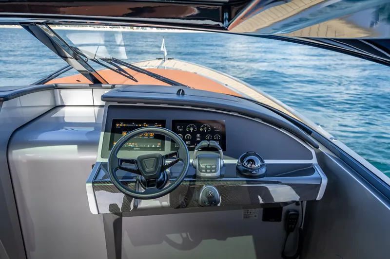 Slide: The Image of Helm of 2024 Wajer 55 HT yacht with modern controls and ocean view. - 82