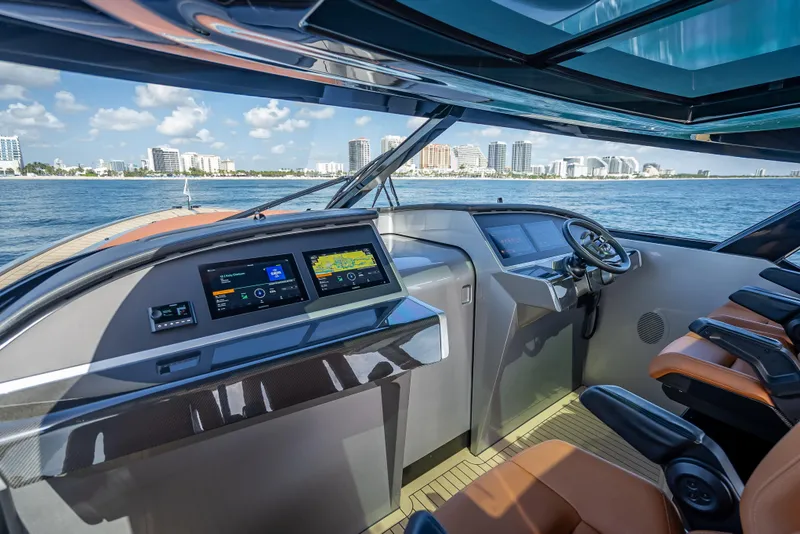Slide: The Image of Luxurious 2024 Wajer 55 HT yacht cockpit with modern navigation displays and ocean view. - 83