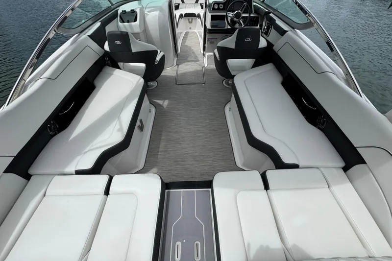 Slide: The Image of 2018 Regal 2500 Bowrider interior with spacious seating and modern design on the water. - 14