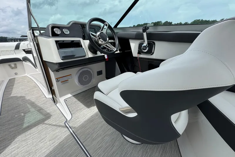 Slide: The Image of 2018 Regal 2500 Bowrider interior with modern dashboard and steering wheel. - 16