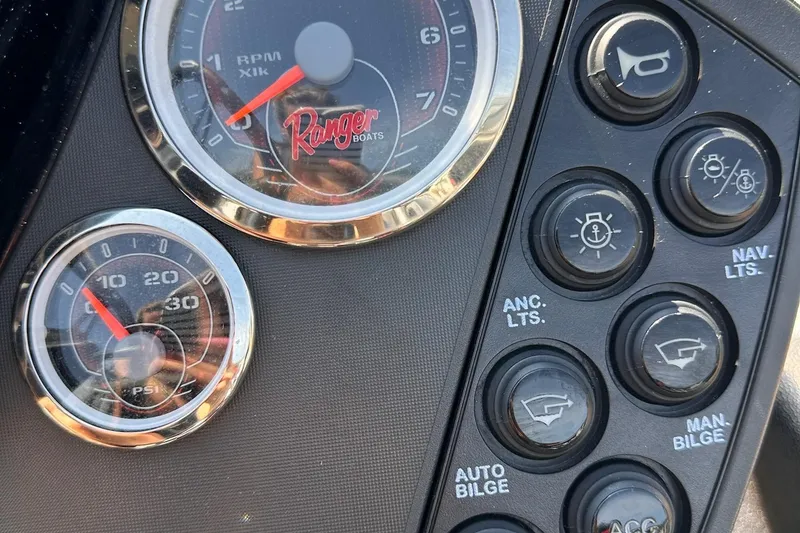 Slide: The Image of Dashboard of 2017 Ranger Z519 boat with gauges and control buttons. - 15