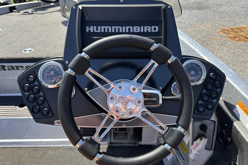 Slide: The Image of Steering wheel and dashboard of 2017 Ranger Z519 boat with Humminbird display. - 16