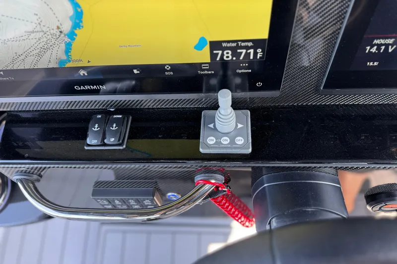 Slide: The Image of Dashboard of 2026 Nor-Tech 390 Sport Center Console with Garmin display and controls. - 30