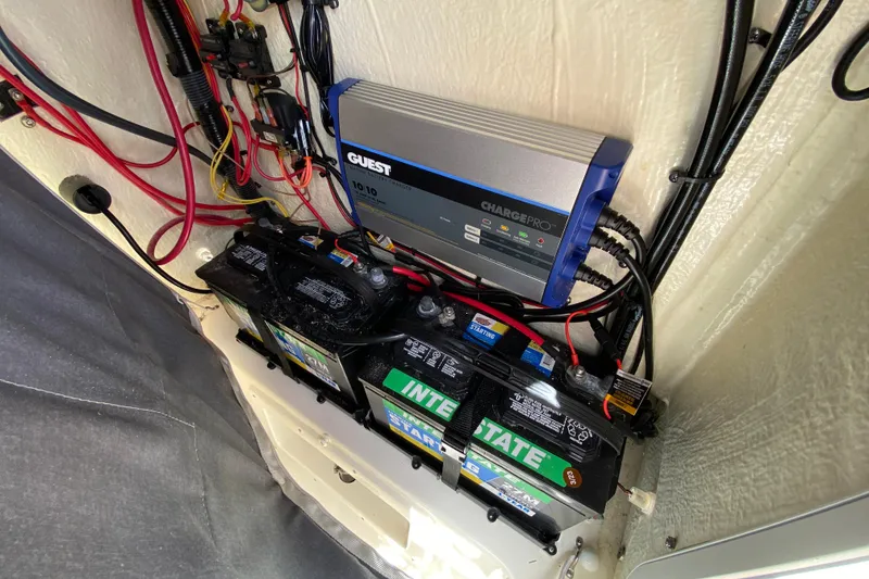 Slide: The Image of Electrical system of 2023 Key West 239 FS boat with batteries and charger. - 105