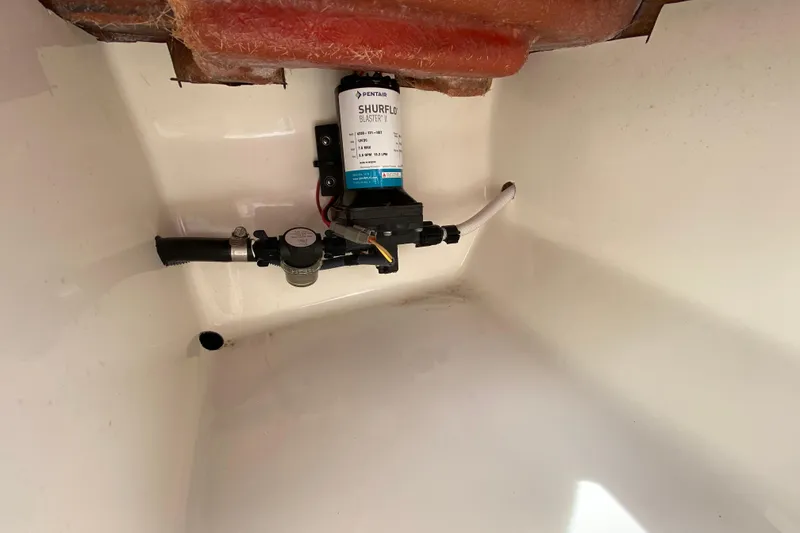 Slide: The Image of 2023 Key West 239 FS boat interior with Shurflo Blaster II pump system. - 32