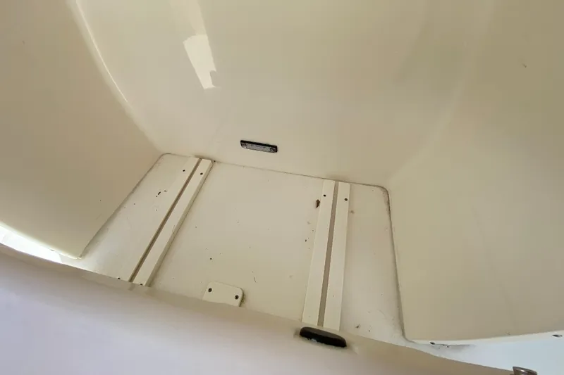 Slide: The Image of Interior view of 2023 Key West 239 FS boat storage compartment. - 47