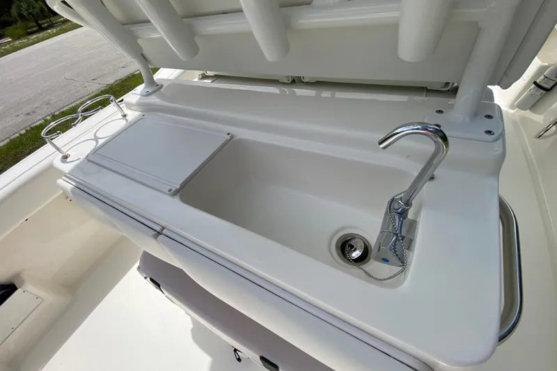 Slide: The Image of 2023 Key West 239 FS boat sink with faucet and cup holders. - 49