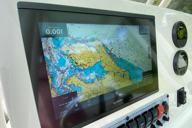 Slide: The Image of Garmin navigation display on 2023 Key West 239 FS boat dashboard. - 60