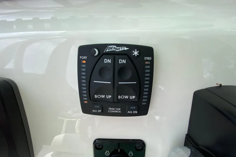 Slide: The Image of Bennett trim tab control panel on 2023 Key West 239 FS boat. - 65
