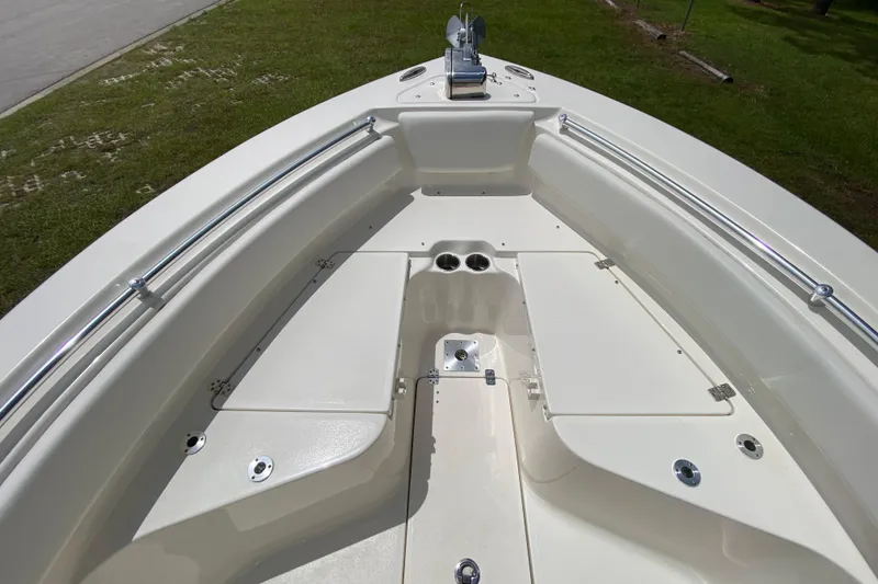Slide: The Image of 2023 Key West 239 FS boat deck with storage compartments and stainless steel rails. - 87