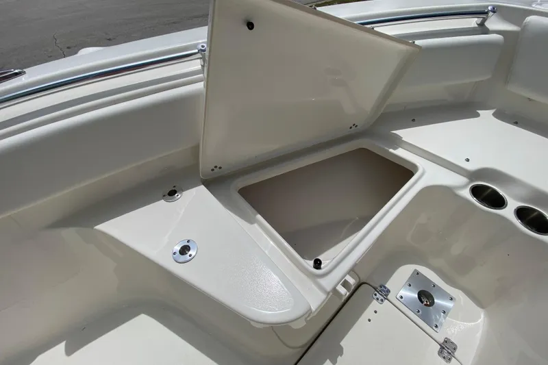 Slide: The Image of 2023 Key West 239 FS boat interior storage compartment with open hatch. - 95