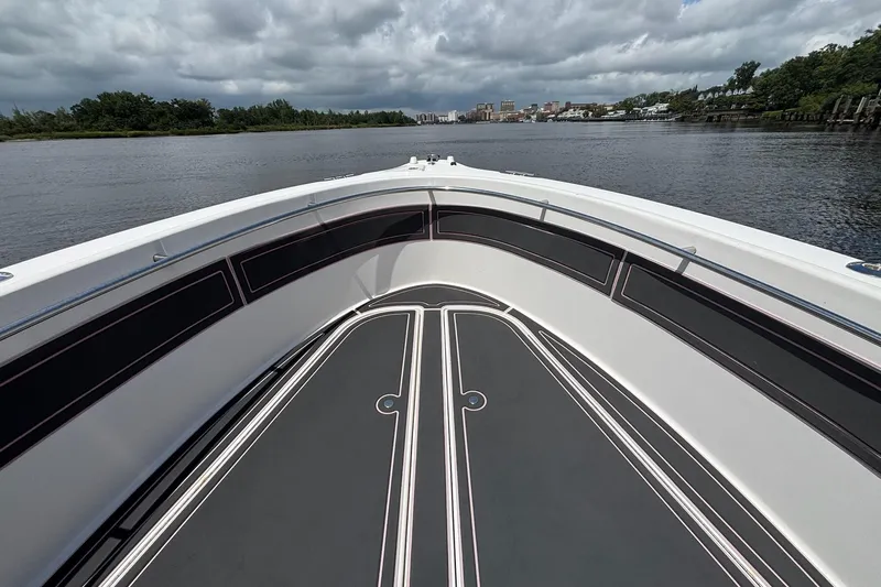 Slide: The Image of 2006 Seaswirl Striper 2601 boat deck with scenic waterway view. - 14